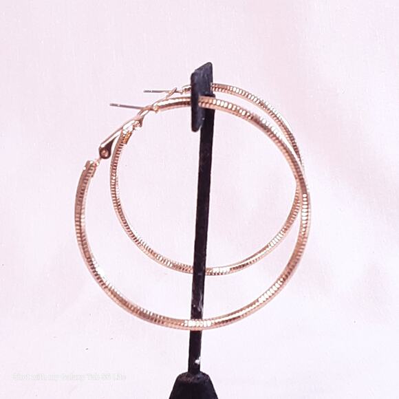 Lustrous Skinny Hoop Earrings Gold Tone Textured Twists Pierced Lever Closure - Picture 1 of 9